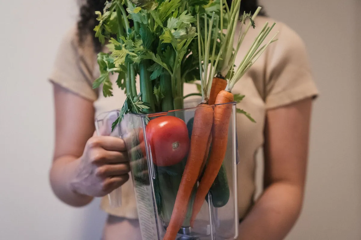 A person thoughtfully selecting a variety of colorful, healthy foods like fruits, vegetables, and whole grains.